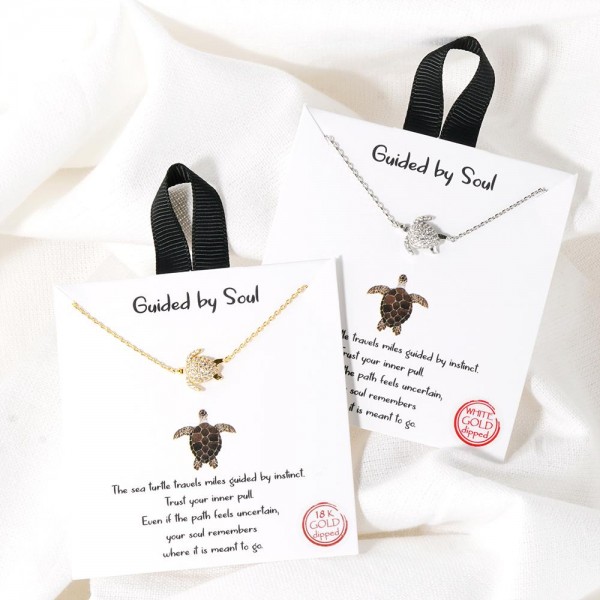 Dainty Chain Link Necklace Featuring Cubic Zirconia Sea Turtle Pendant

- Approximately 16" L
- Extender 2" L
- Hypoallergenic Brass Base
- 18K Gold or White Gold Dipped
- Made in Korea
-Card: " The sea turtle travels miles guided by instinct. Trust Your inner pull. Even if path feels uncertain, your soul remembers where it is meant to go."



