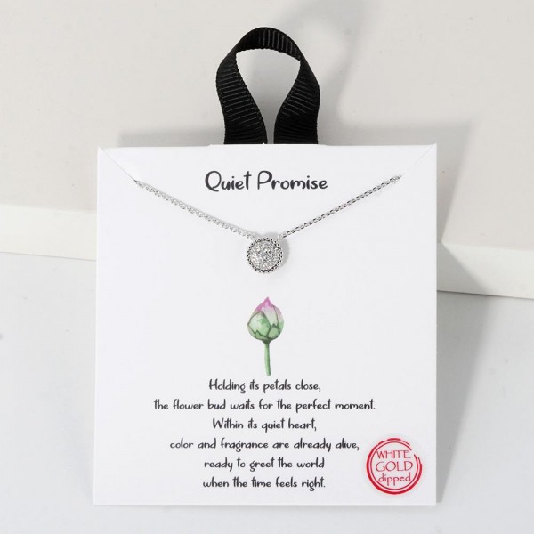 Dainty Chain Link Necklace Featuring Circular Cubic Zirconia Pendant 			
					
- Approximately 16" L					
- Extender 2" L					
- Hypoallergenic Brass Base					
- 18K Gold Dipped					
- Card: "Holding its petals close, the flower bud waits for the perfect moment. Within its quiet heart, color and fragrance are already alive, ready to greet the world when the time feels right."					