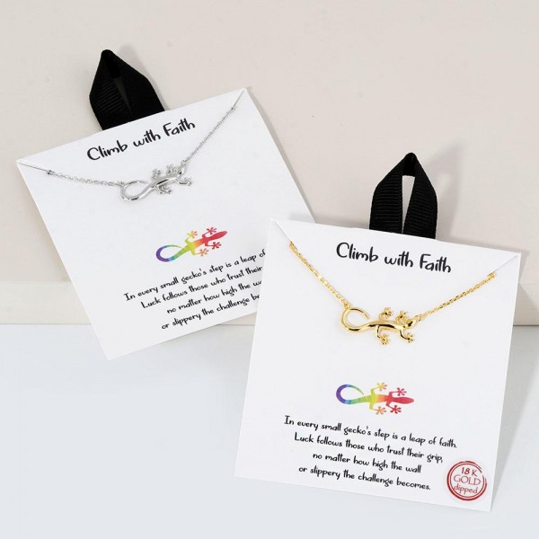 Dainty Chain Link Necklace Featuring Metal Tone Lizard Pendant 					
					
- Approximately 16" L					
- Extender 2" L					
- Hypoallergenic Brass Base					
- 18K Gold Dipped					
- Card: "In every small gecko's step is a leap of faith. Luck follows those who trust their grip, no matter how high the wall or slippery the challenge becomes."					