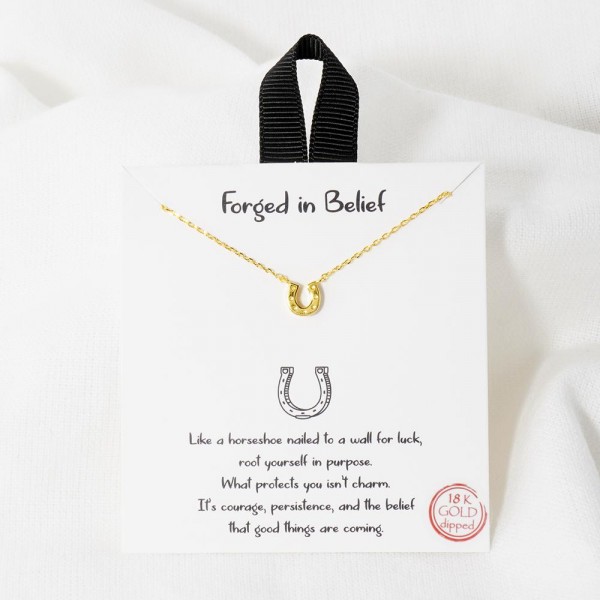 Dainty Chain Link Necklace Featuring Metal Tone Horseshoe Pendant 

- Approximately 16" L					
- Extender 2" L					
- Hypoallergenic Brass Base					
- 18K Gold Dipped					
- Card: "Like a horseshoe nailed to a wall for luck, root yourself in purpose. What protects you isn't charm. It's courage, persistence, and the belief that good things are coming."					
