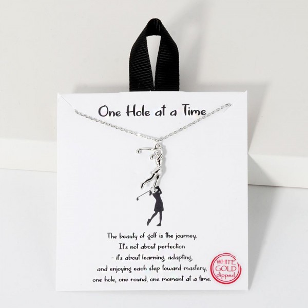 Dainty Chain Link Necklace Featuring Metal Tone Golf Player Pendant 					
					
- Approximately 16" L					
- Extender 2" L					
- Hypoallergenic Brass Base					
- 18K Gold Dipped					
- Card: "The beauty of golf is the journey. It's not about perfection- it's about learning, adapting, and enjoying each step toward mastery, one hole, one round, one moment at a time ."					