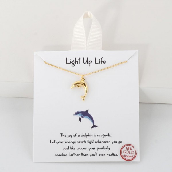 Dainty Chain Link Necklace Featuring Metal Tone Dolphin Pendant 					
					
- Approximately 16" L					
- Extender 2" L					
- Hypoallergenic Brass Base					
- 18K Gold Dipped					
- Card: "The joy of a dolphin is magnetic. Let your energy spark light wherever you go. Just like waves, your positivity reaches farther than you'll ever realize."					