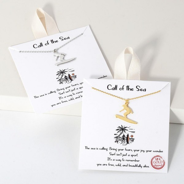 Dainty Chain Link Necklace Featuring Metal Tone Surfer Pendant					
					
- Approximately 16" L					
- Extender 2" L					
- Hypoallergenic Brass Base					
- 18K Gold Dipped					
- Card: " The sea is calling. Bring your fears, your joy, your wonder: Surf isn't just a sport. It's a way to remember you are free, wild, and beautifully alive."					