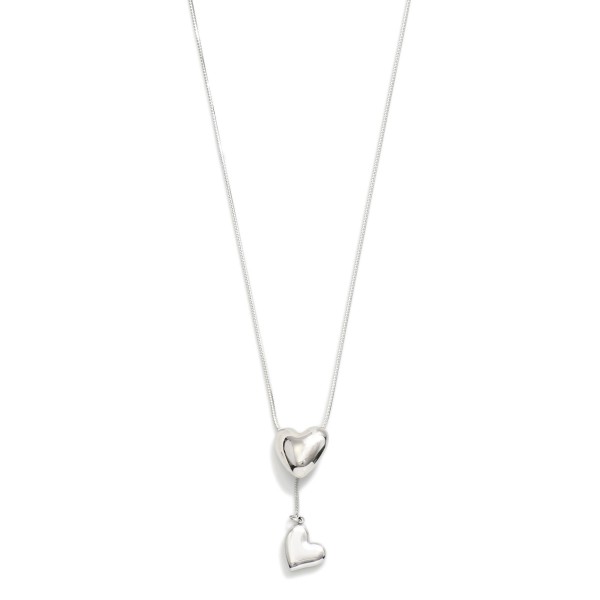 Chain Link Y Necklace Featuring Puffy Heart Details

- Stainless Steel
- Water Resistant
- Approximately 18" L