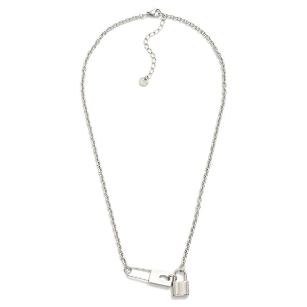 Chain Link Necklace Featuring Metal Tone Lock Pendant 

- Stainless Steel
- Water Resistant
- Approximately 16" L
- Extender 2" L