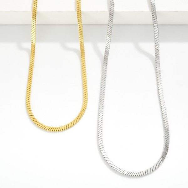 Snake Chain Necklace 

- Stainless Steel
- Water Resistant
- Approximately 16" L
- Extender 2" L