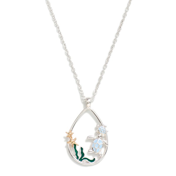 Chain Link Necklace Featuring Teardrop Pendant With Enamel Sea Creatures 

- Approximately 16" L
- Extender 3" L