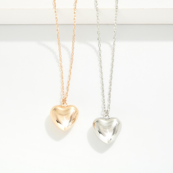 Chain Link Necklace Featuring Buffy Metal Tone Pendant Necklace 

- Approximately 14" L
- Extender 3" L