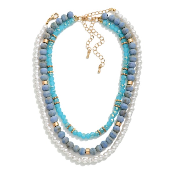 Layered Necklace Featuring Wood, Pearl, & Faceted Beads

- Approximately 14" L
- Extender 3" L