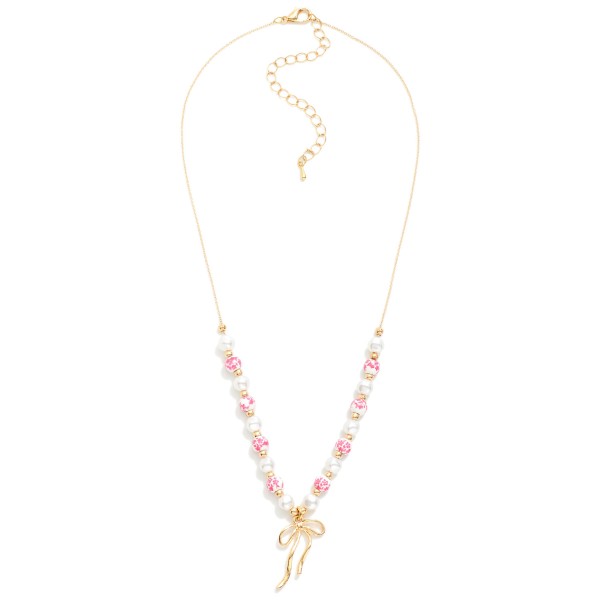 Pearl & Chinoiserie Bead Beaded Chain Link Necklace Featuring Metal Tone Bow Pendant 

- Approximately 16" L
- Extender 2" L