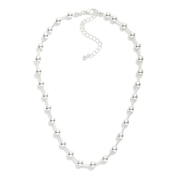 Metal Tone Bead & Tube Beaded Necklace 

- Approximately 12" L
- Extender 3" L