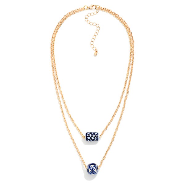 Layered Chain Link Necklace Featuring Painted Porcelain Pendents 

- Approximately 16" L 
- Extender 2" L 