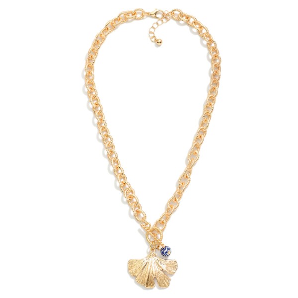 Twisted Link Chain Link Necklace Featuring Chinoiserie Beads & Metal Tone Leaf With Toggle Clasp 

- Approximately 16" L