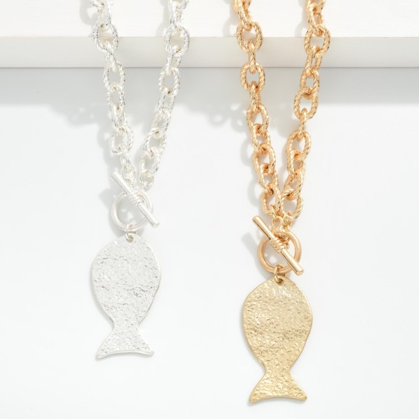 Twisted Metal Link Chain Link Necklace Featuring Hammered Metal Fish Pendant & Toggle Clasp

- Approximately 16" L
