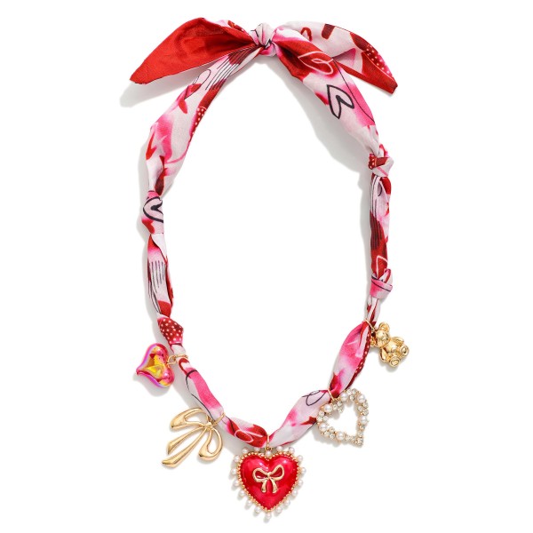 Valentines Day Scarf Necklace Featuring Hearts, Teddy Bear, & Bow Charms

- Approximately 16" L
