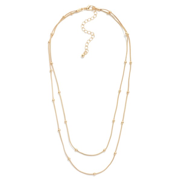 Layered Chain Link Necklace Featuring Metal Tone Ball Stations 

- Approximately 16" L
- Extender 2" L