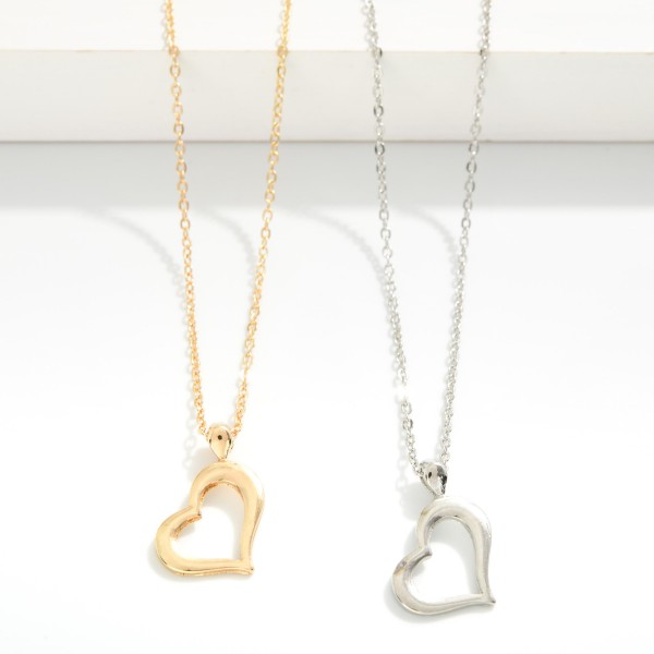 Chain Link Necklace Featuring Metal Tone Heart Pendant 

- Approximately 15.5" L
- Extender 2" L