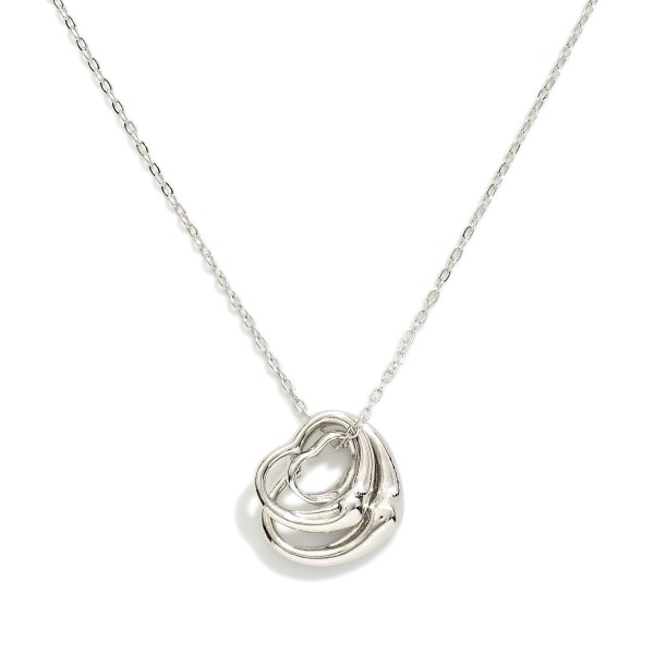 Chain Link Necklace Featuring Layered Metal Tone Heart Pendants 

- Approximately 15.5" L
- Extender 2" L
