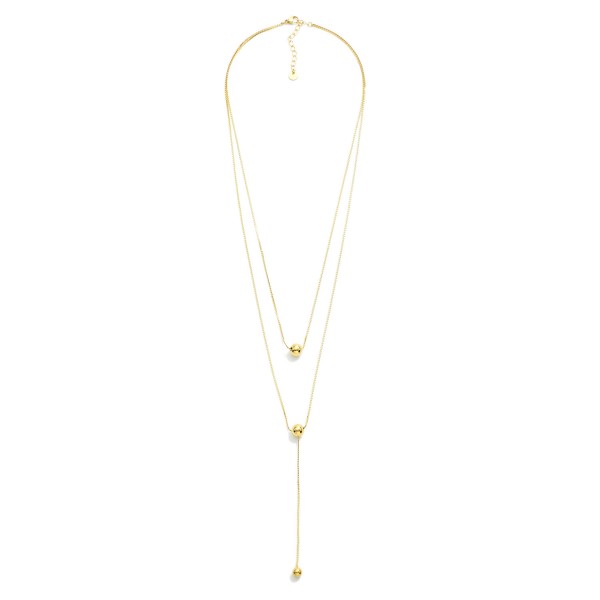 Layered S Link Necklace Featuring Metal Tone Ball Details 

- Stainless Steel
- Water Resistant
- Approximately 18" L
- Extender 2" L