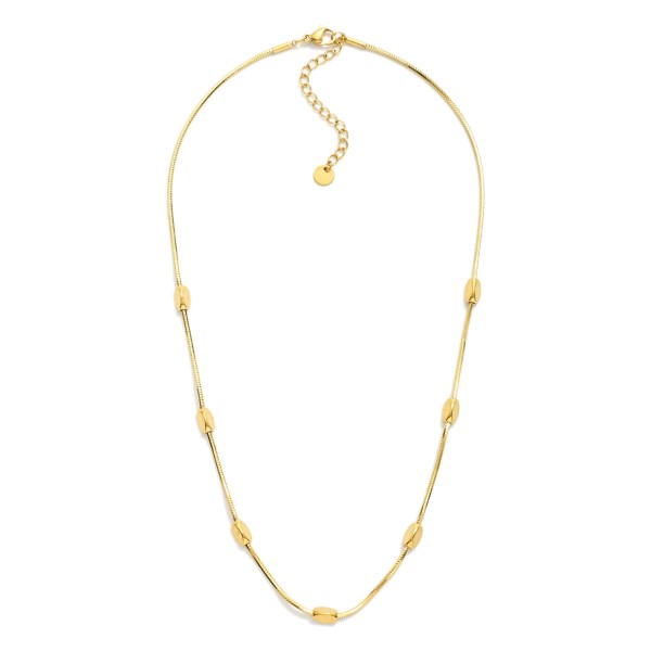 Chain Link Necklace Featuring Metal Tone Geometric Shape Stations

- Stainless Steel
- Water Resistant
- Approximately 15.5" L
- Extender 2" L