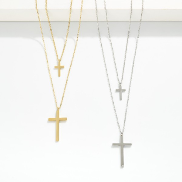 Layered Chain Link Necklace Featuring Metal Tone Cross Pendants   

- Stainless Steel 
- Approximately 15.5" L
- Extender 2" L