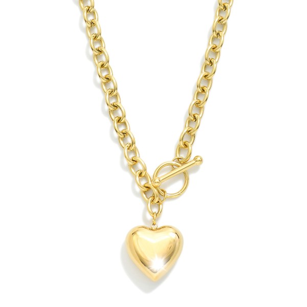 Chain Link Necklace Featuring Metal Tone Puffy Heart Pendant & Toggle Clasp

- Stainless Steel
- Water Resistant
- Approximately 15.5" L
- Extender 2" L