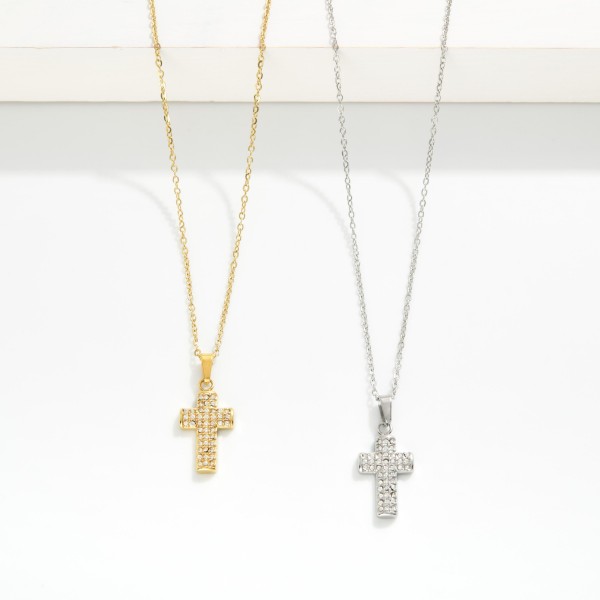 Chain Link Necklace Featuring Pave Rhinestone Cross Pendant  

- Stainless Steel 
- Approximately 15.5" L
- Extender 2" L