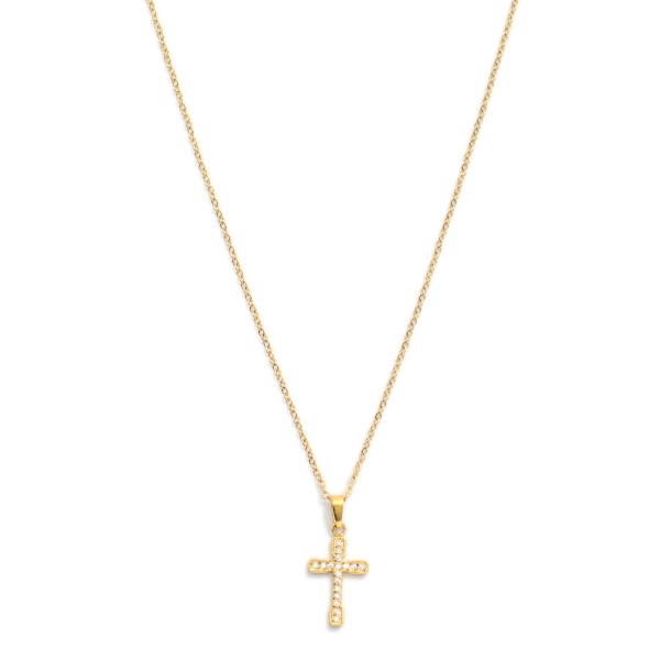 Dainty Chain Link Necklace Featuring Rhinestone Cross Pendant 

- Stainless Steel
- Water Resistant
- Hypoallergenic 16" L
- Extender 2" L