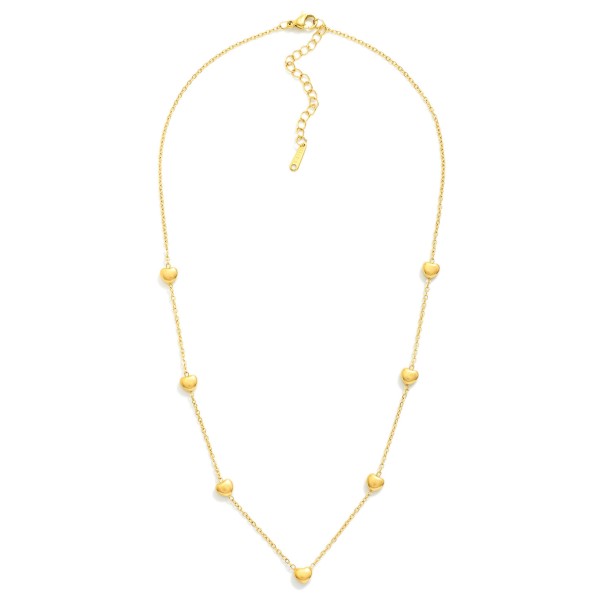 Chain Link Necklace Featuring Puffy Heart Stations  

- Stainless Steel
- Water Resistant
- Approximately 14" L
- Extender 2" L