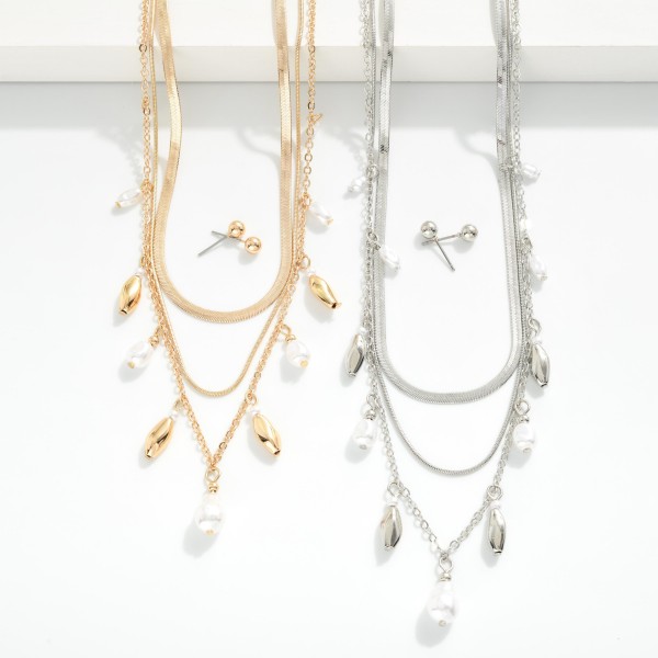 Layered Multi Chain Link Necklace With Pearl Charms 

- Metal Tone Ball Studs Included 
- Approximately 14" L
- Extender 2" L