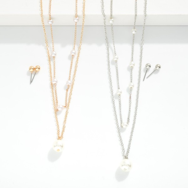 Layered Chain Link Necklace With Pearl Stations 

- Metal Tone Ball Studs Included 
- Approximately 16" L
- Extender 2" L