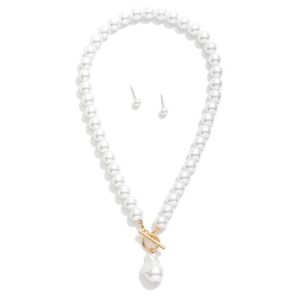 Pearl Beaded Necklace With Baroque Pearl & Toggle Clasp Pendant

- Metal Tone Ball Studs Included 
- Approximately 16" L
- Extender 2" L