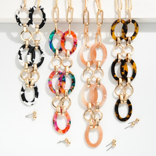 Acetate & Metal Chain Link Necklace

- Metal Tone Ball Stud Earrings
- Approximately 16" L
- Extender 2" L 