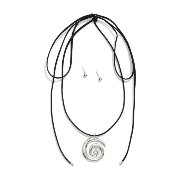 Vegan Leather Wrap Necklace Featuring Metal Tone Swirl Pendant 

- Metal Tone Ball Studs Included 
- Approximately 32" L
