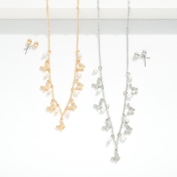 Chain Link Necklace With Pearl & Metal Tone Butterfly Charms 

- Metal Tone Ball Studs Included 
- Approximately 16" L
- Extender 2" L