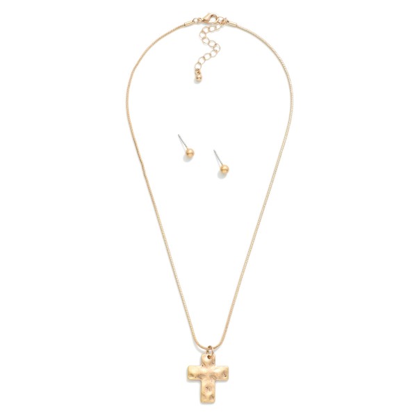 Snake Chain Link Necklace Featuring Hammered Metal Cross Pendant 

- Metal Tone Ball Studs Included 
- Approximately 16" L
- Extender 2" L