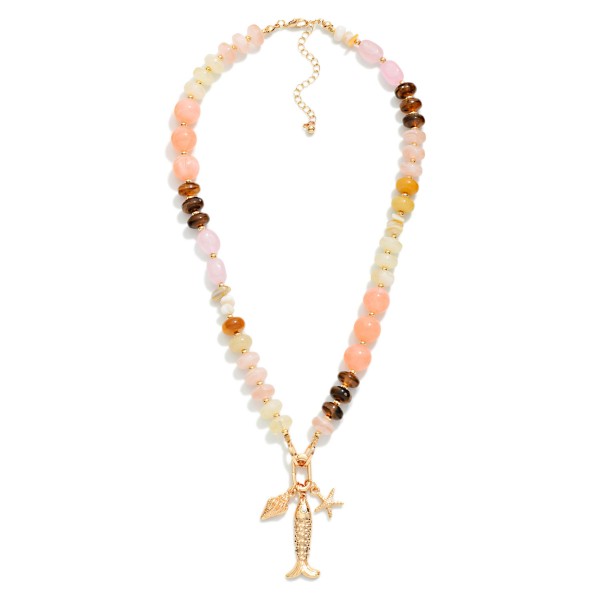 Marbled Acetate & Stone Beaded Necklace Featuring Metal Tone Fish & Shell Pendant 

- Approximately 16" L
- Extender 3" L