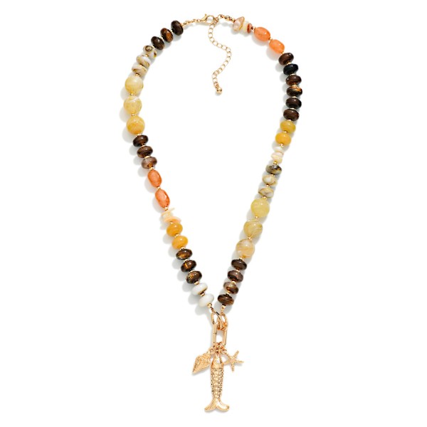 Marbled Acetate & Stone Beaded Necklace Featuring Metal Tone Fish & Shell Pendant 

- Approximately 16" L
- Extender 3" L