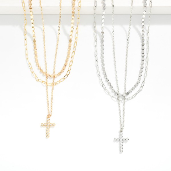 Layered Chain Link Necklace Featuring Flat Metal Beads & Rhinestone Cross Pendant 

- Approximately 16" L
- Extender 3" L