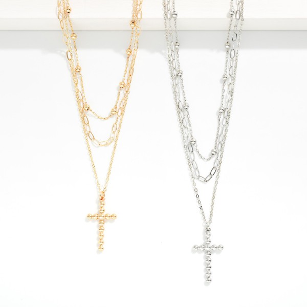 Layered Chain Link Necklace Featuring Bubble Cross Pendant 

- Approximately 16" L
- Extender 3" L