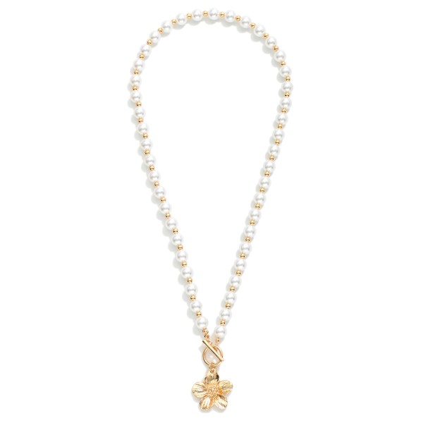 Pearl & Metal Tone Bead Beaded Necklace Featuring Toggle Clasp & Metal Tone Flower Pendant 

- Approximately 18" L
- Extender 3" L