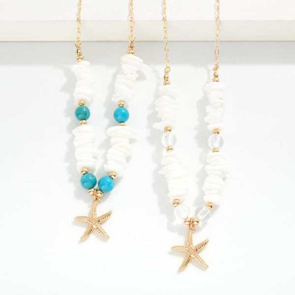 Metal Tone Chain Link Necklace Featuring Star Pendant With Broken Shell Beads, Round Beads, And Metal Tones

- Approximately 16" L 
- Extender 3" L  