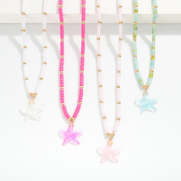 Heishi Beaded Necklace Featuring Metal Tone Accents And Star Pendant

- Approximately 17" L
- Extender 3" L
