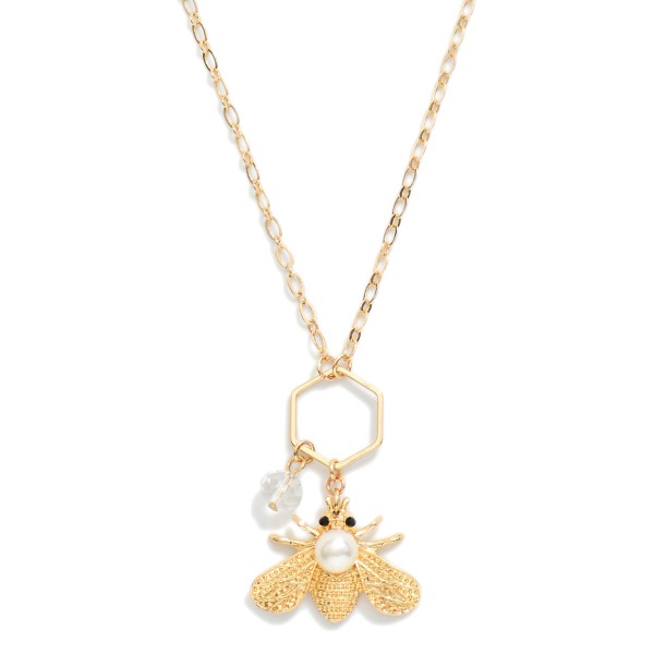 Chain Link Necklace Featuring Metal Tone Hexagon & Insect Pendent 

- Approximately 16" L
- Extender 3" L