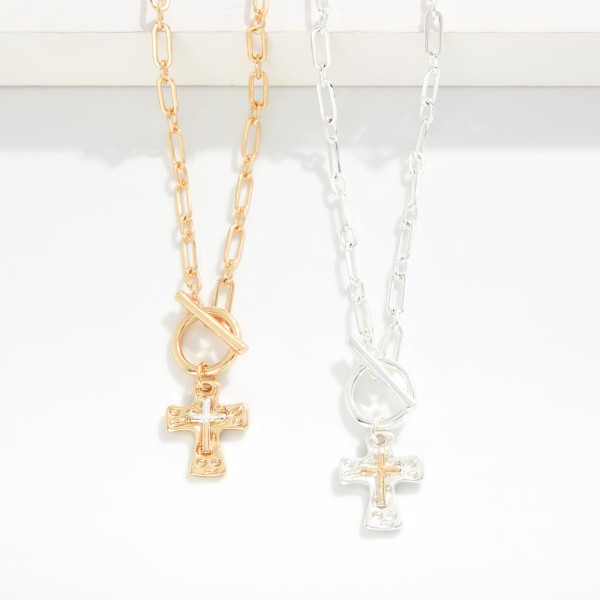 Paper Clip Chain Link Necklace Featuring Two Tone Cross Pendant With Toggle Clasp 

- Approximately 16.50" L 