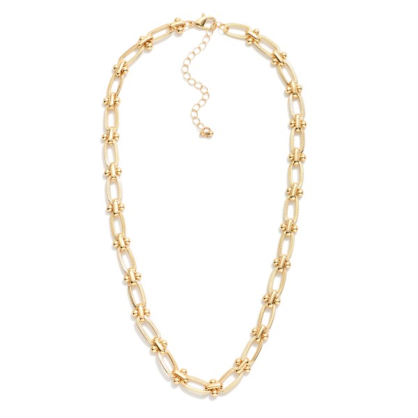 Textured Oval Chain Link Necklace Featuring Metal Tone Ball Details 

- Approximately 16" L
- Extender 3" L
