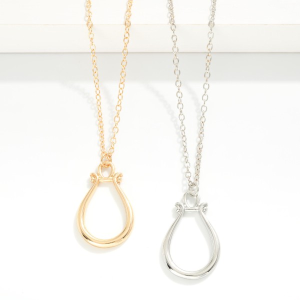 Long Chain Link Necklace Featuring Metal Tone Ring Holder Pendant

- Approximately 22" L
- Extender 3" L