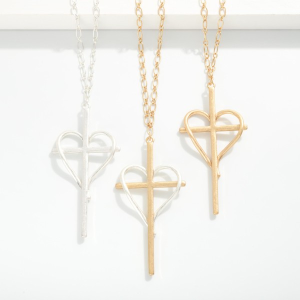 Long Chain Link Necklace Featuring Metal Tone Heart & Cross Pendant 

- Approximately 32" L
- Extender 3" L