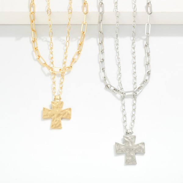Layered Metal Tone Paperclip Chain Link Necklace Featuring Hammered Cross Pendent 

- Approximately 24" L 
- Extender 3" L 