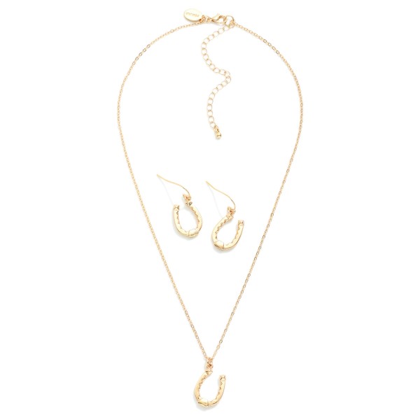 Chain Link Necklace Featuring Metal Tone Horseshoe Pendant 

- Horseshoe Drop Earrings Included 1" L
- Necklace Approximately 14" L
- Extender 3" L